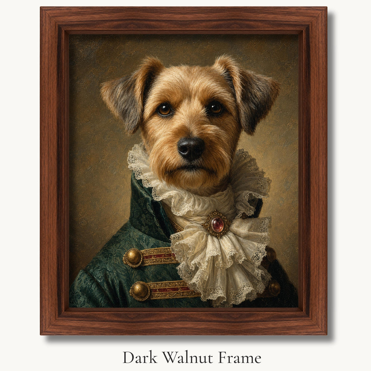 Small tan terrier in a green coat and white lace cravat in a dark walnut picture frame.